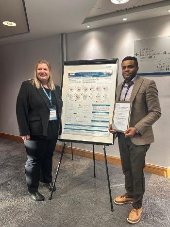 Oluwole Andeniyi recieving a poster award at the Gambling Commission Conference on 5th March Birmingham